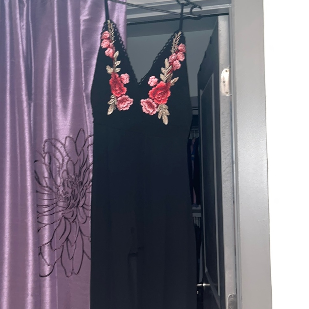 Zip up romper w doubles as a maxi dress from the back